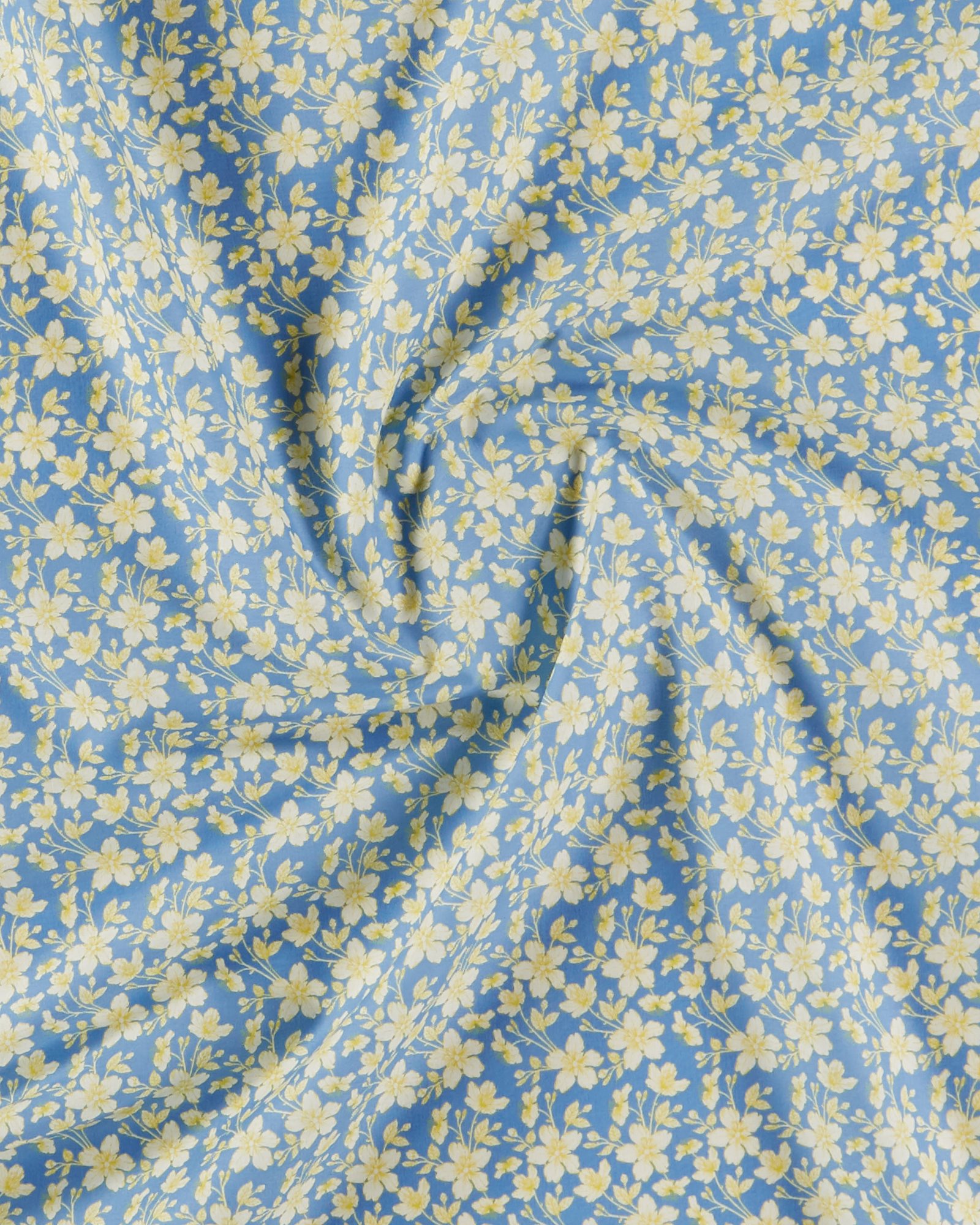 Bomuld gul omrids blomster på blå 852501_pack