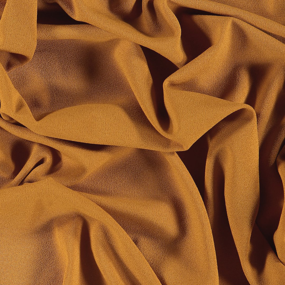 Billede af Crepe georgette m stretch varm mørk gul