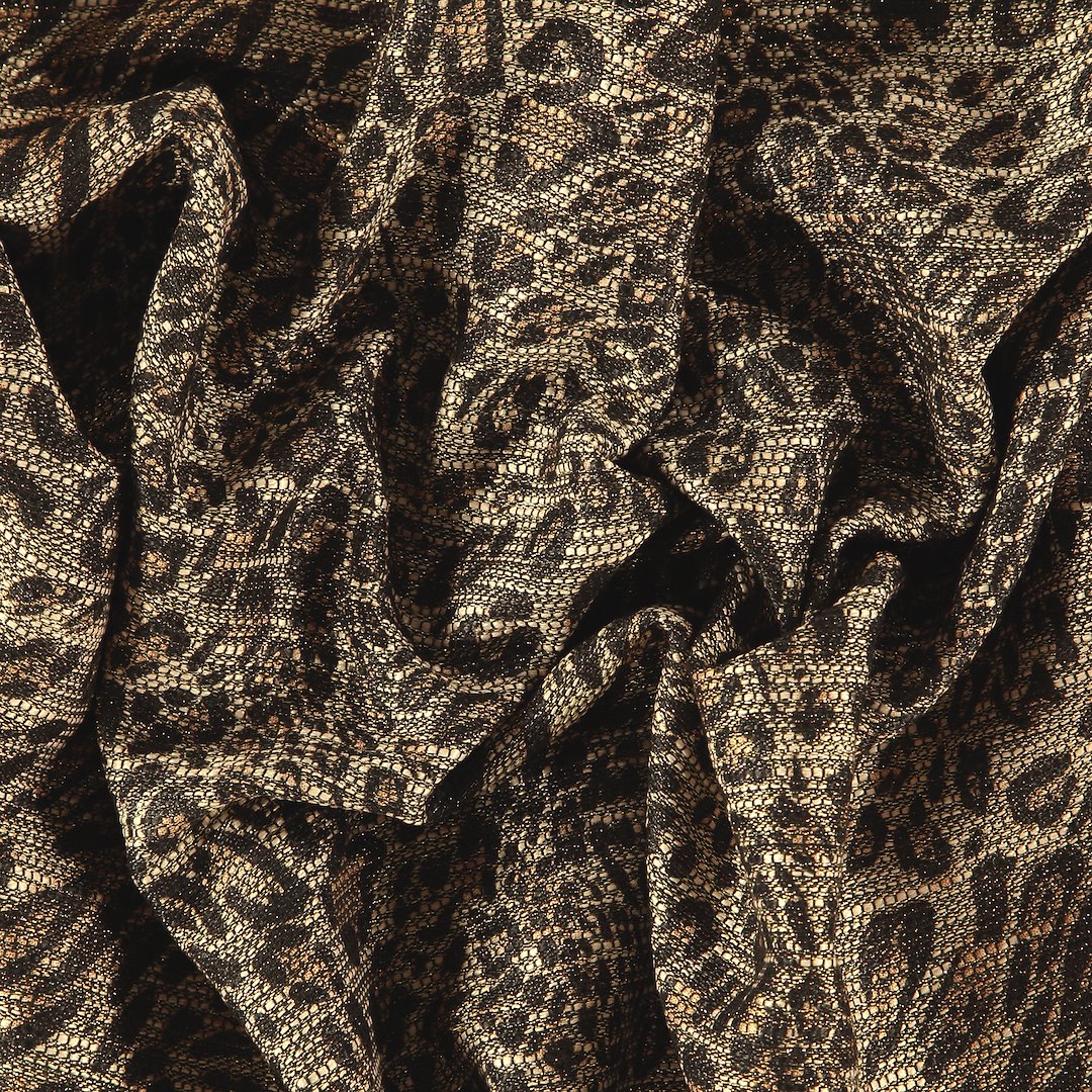 Billede af Vævet boucle med guld/sort leo mønster