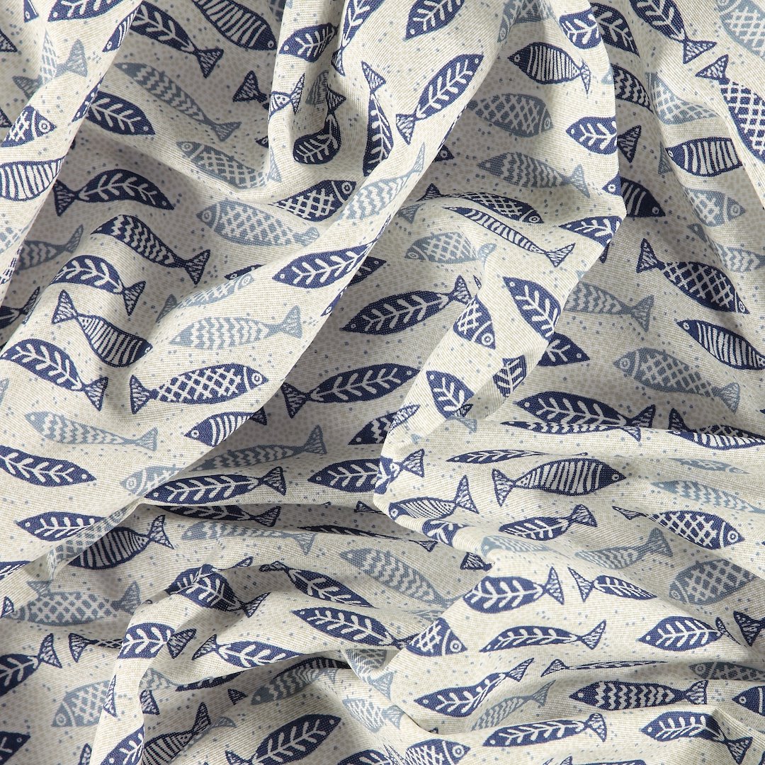 Billede af Vævet creme med blå fiskeprint