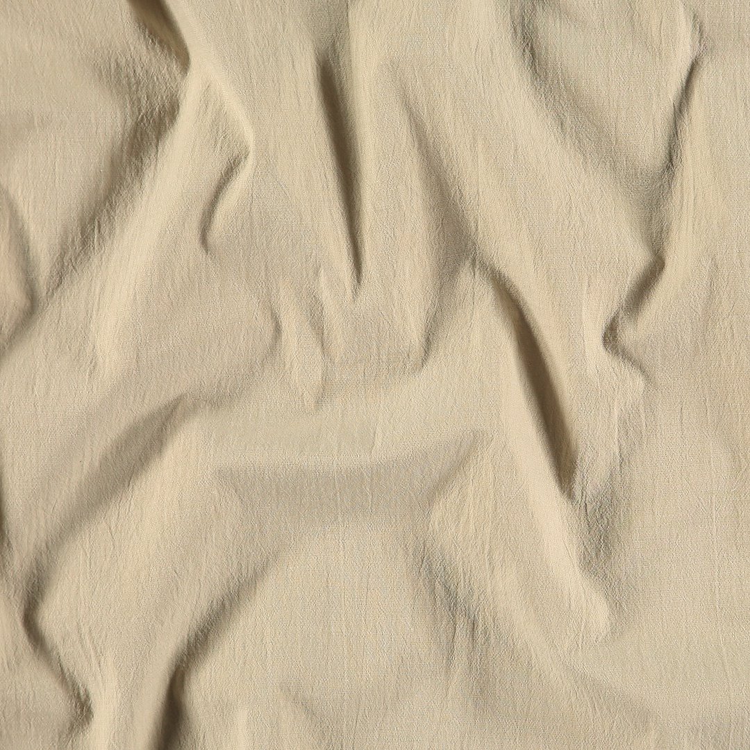 Billede af Vævet stretch bomuld med struktur sand
