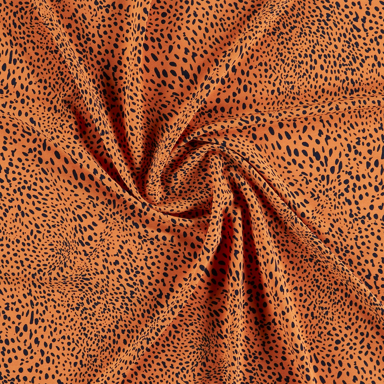 Woven crepe stretch orange w uneven dots 502094_pack